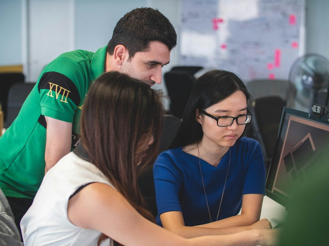 team of programmers collaborating