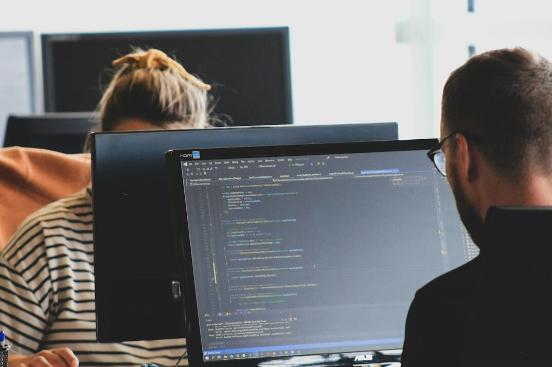 developers coding insurance software